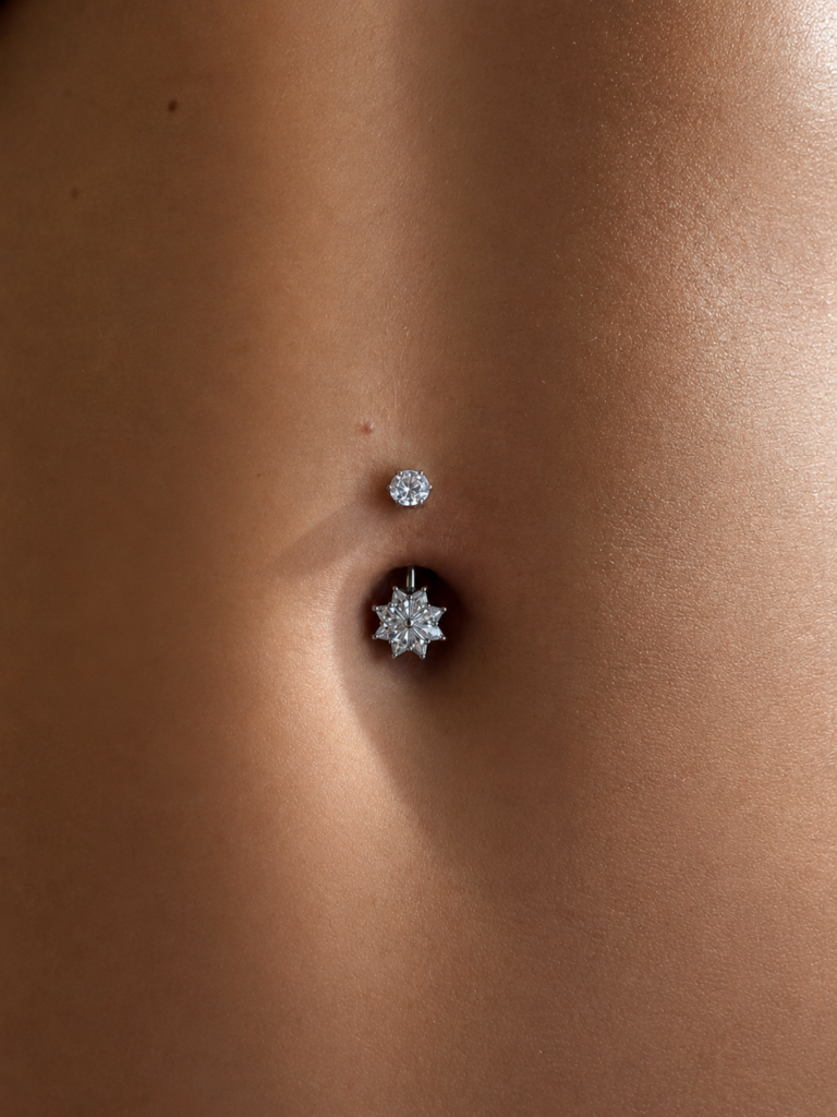Silver navel piercing with a star set with white crystals and white zirconia.