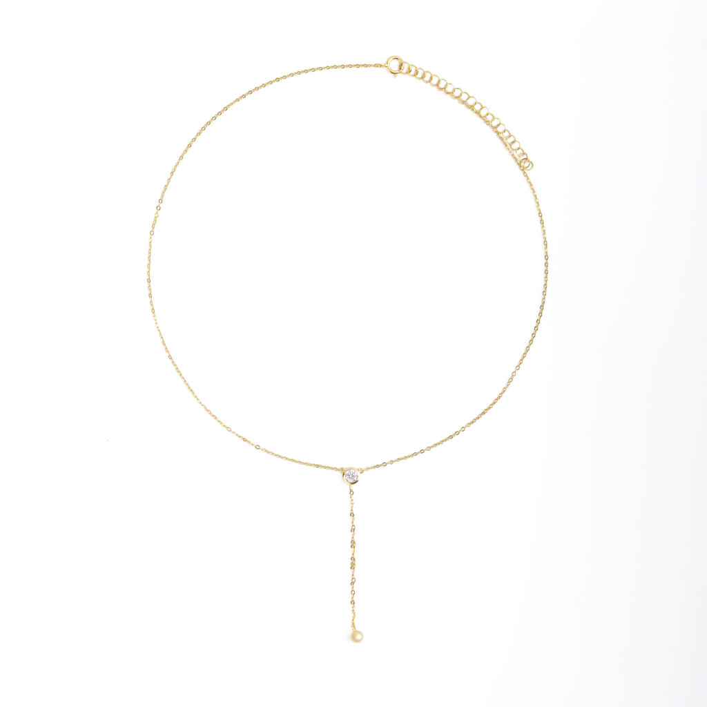 Collier VELYX en argent sterling 925 doré 18 carats avec zircone blanche suspendue.