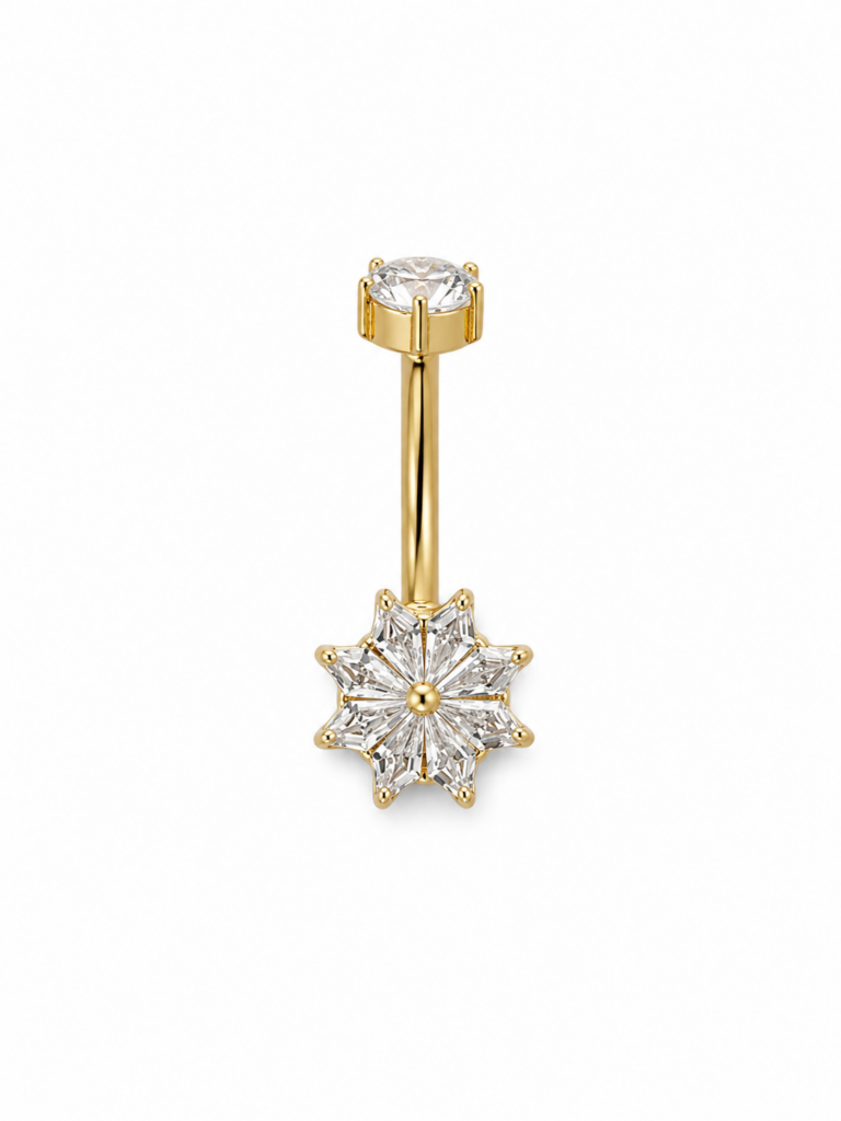 Piercing de nombril doré avec étoile en cristaux blancs et zircone blanche.